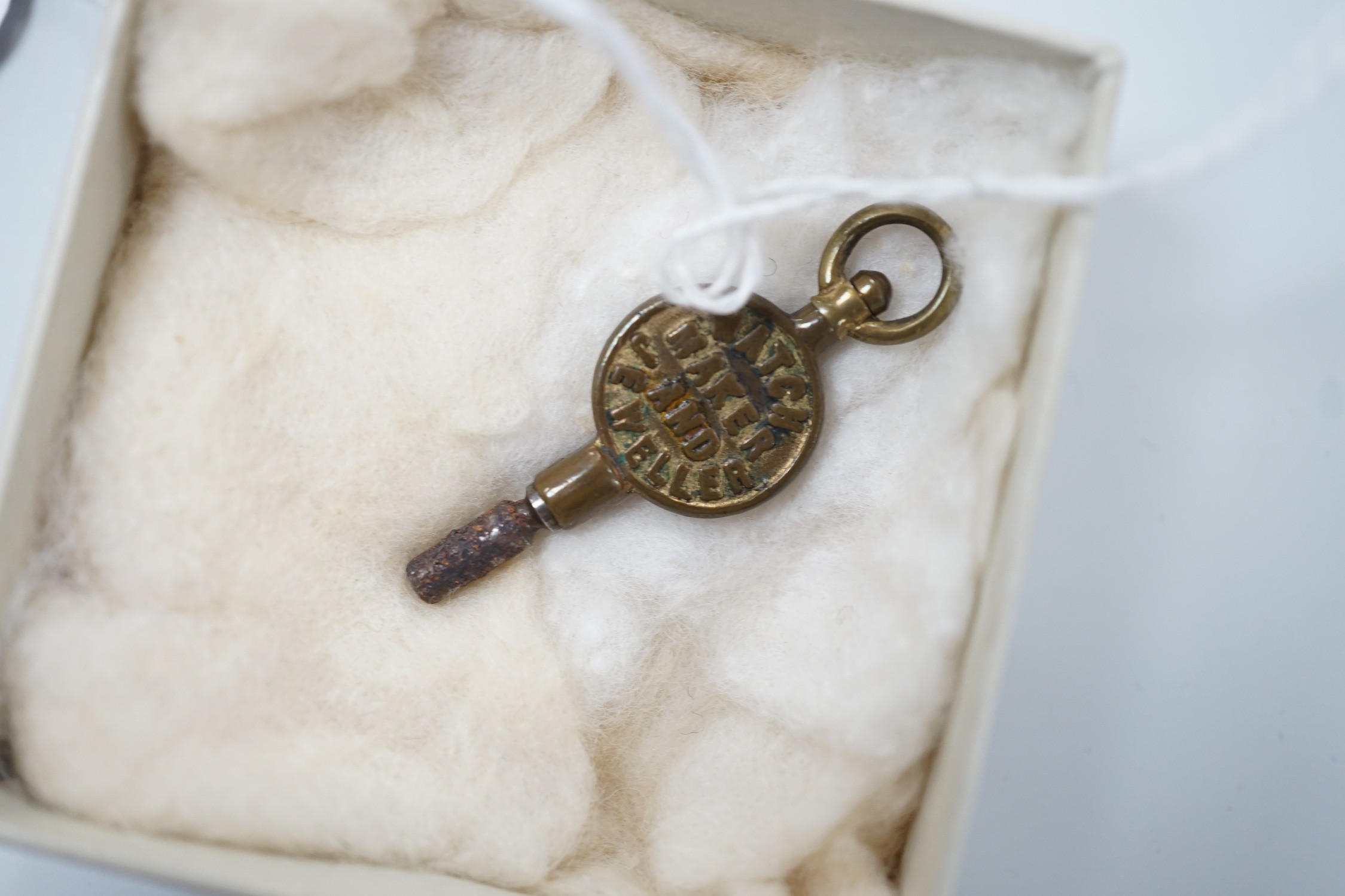 A continental 18k yellow metal open faced fob watch, with Roman dial and key, 40mm, gross weight 41.8 grams.